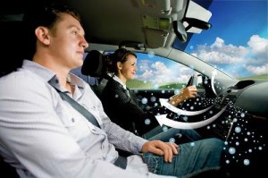 a young woman driving a car